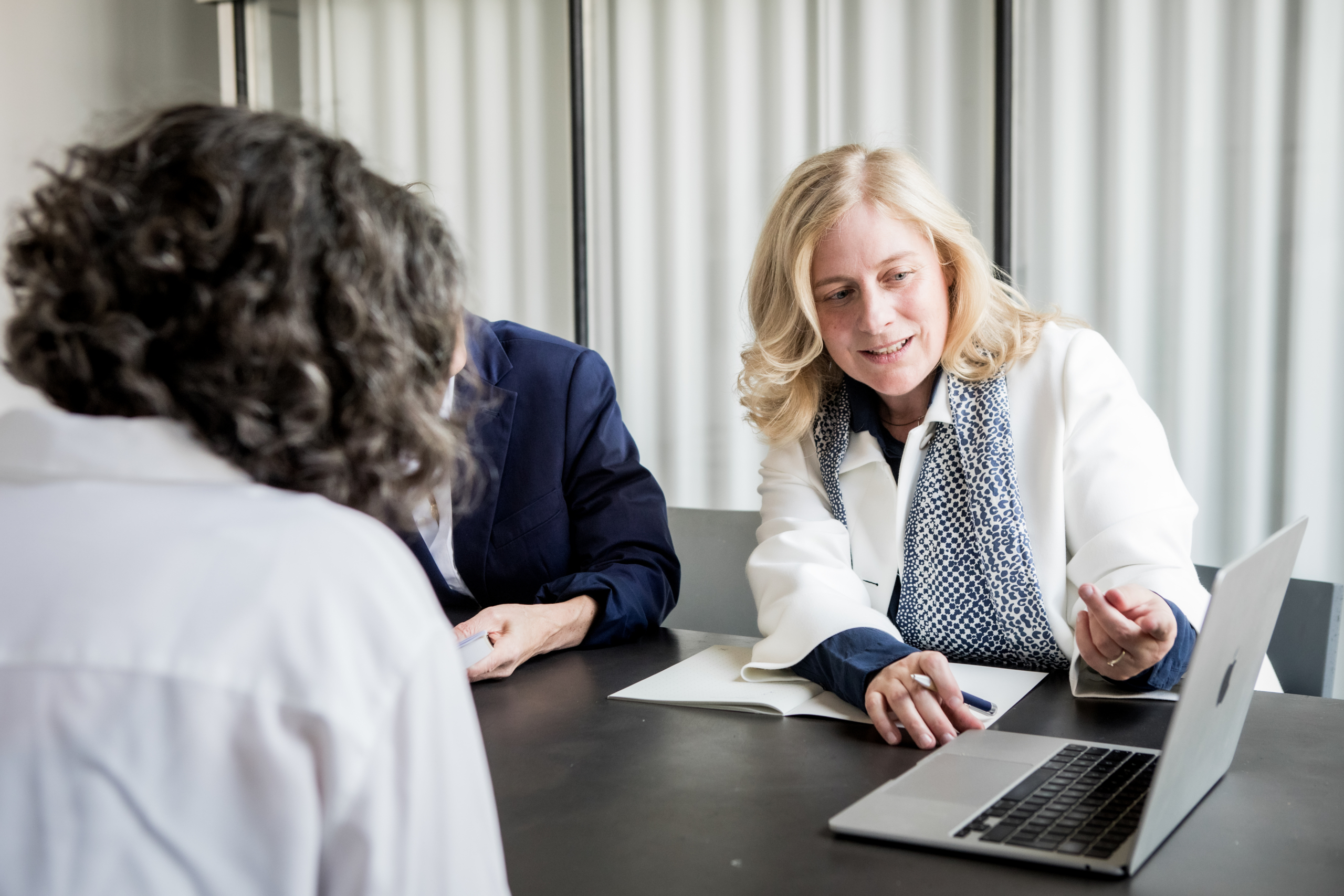 Diverse group of professionals at a negotiation table